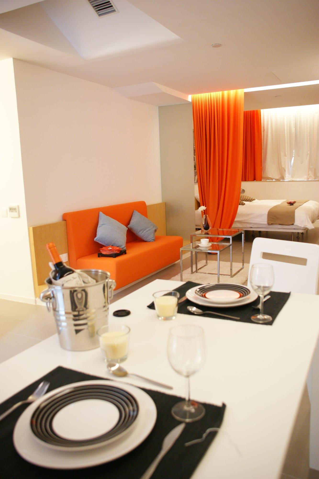 Фото 60 West Suites Hotel