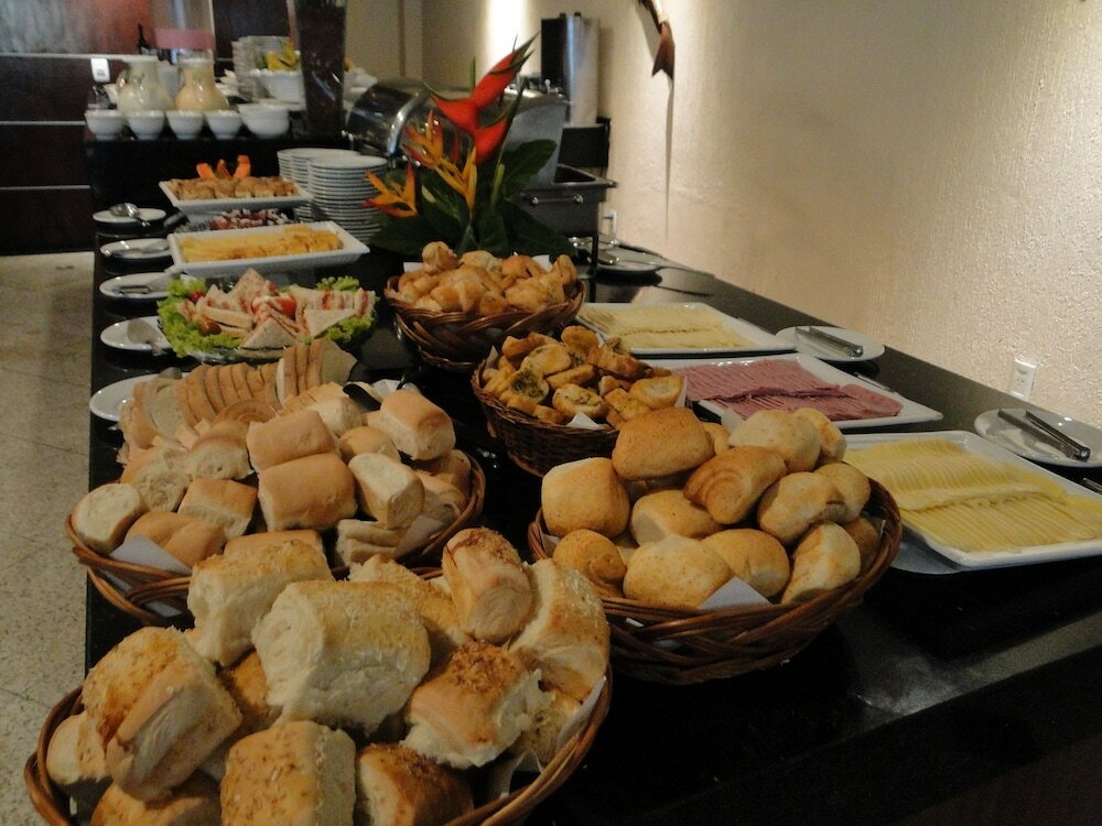 Фото Plaza Praia Suites