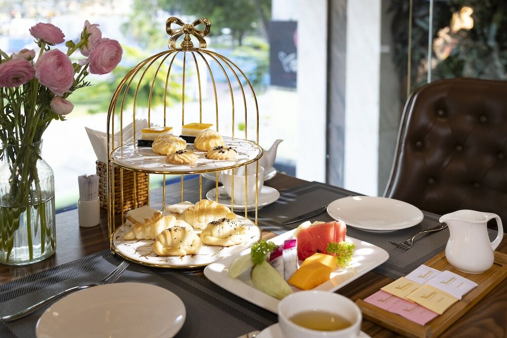 Фото Winsuites Saigon Hotel