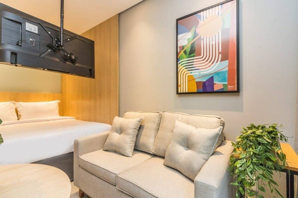 Фото Cozzy Suítes Paraíso Hotel