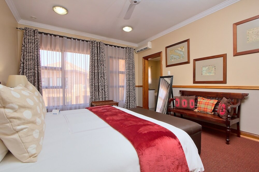 Фото Centurion Golf Suites Boca Walk