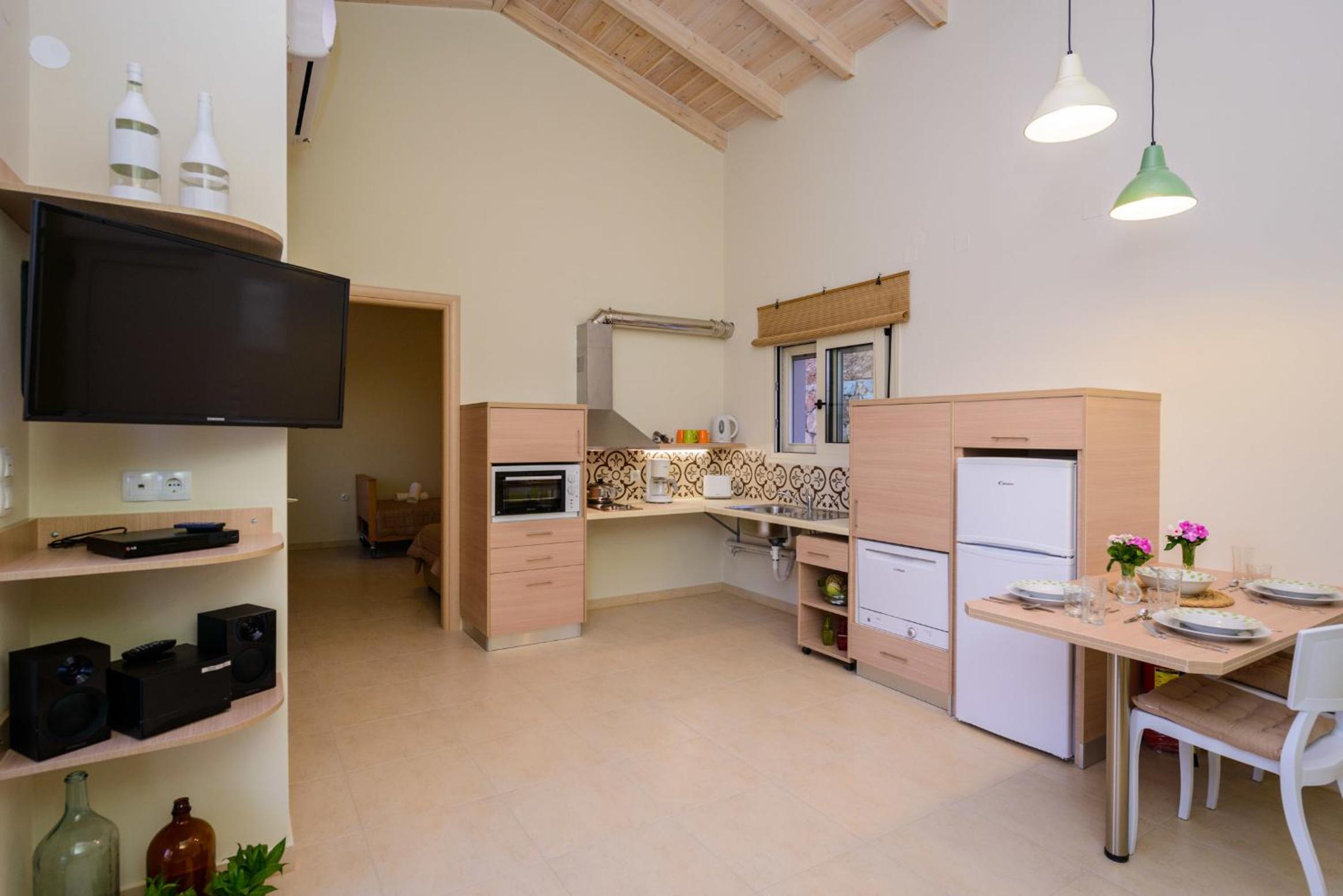 Фото Αksos Suites Accessible Accommodation