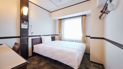 Гостиница Toyoko Inn Shin-takaoka-eki Shinkansen Minami-guchi в Такаоке