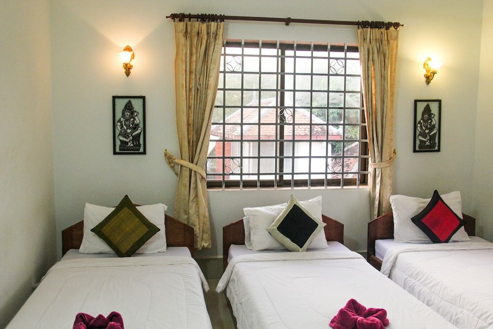 Фото Tropical Breeze Guesthouse