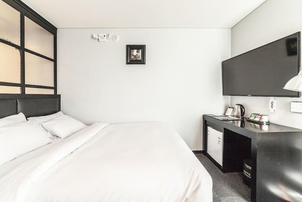 Фото Gangneung Tourist Hotel