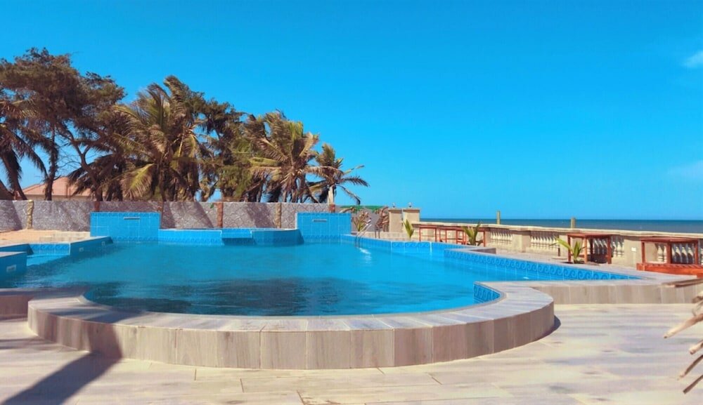 Фото Coconut Pointe Villa & Beach Resort