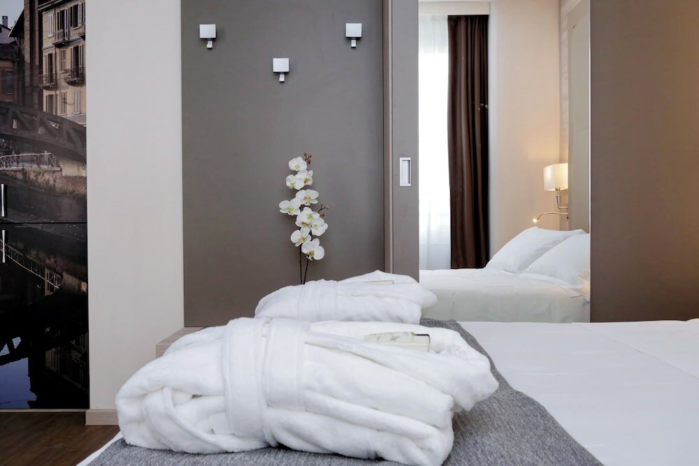 Фото Duomo Hotel & Apartments