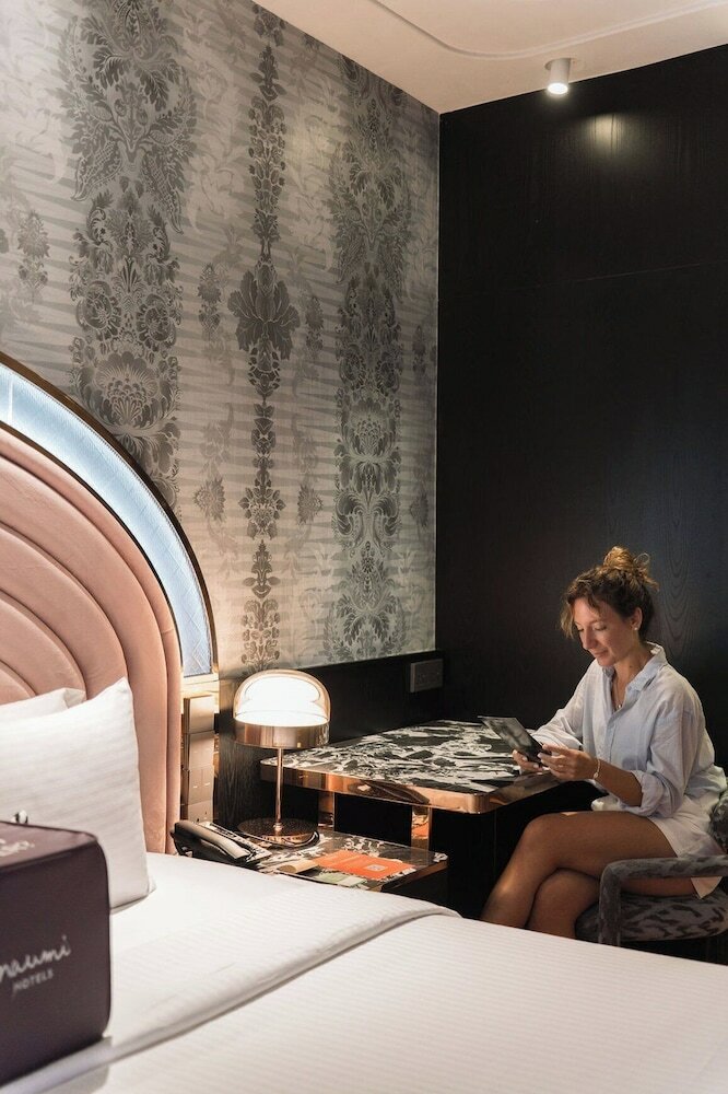 Фото Naumi Hotel Singapore