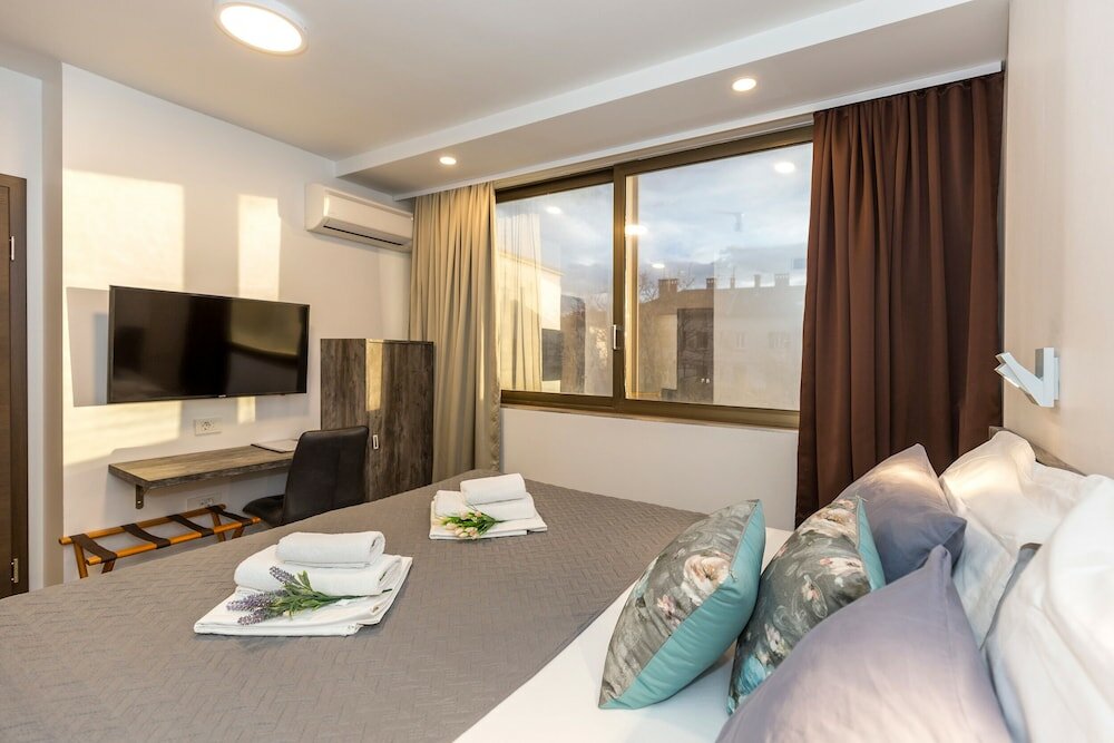 Фото Apinelo Tower Rooms