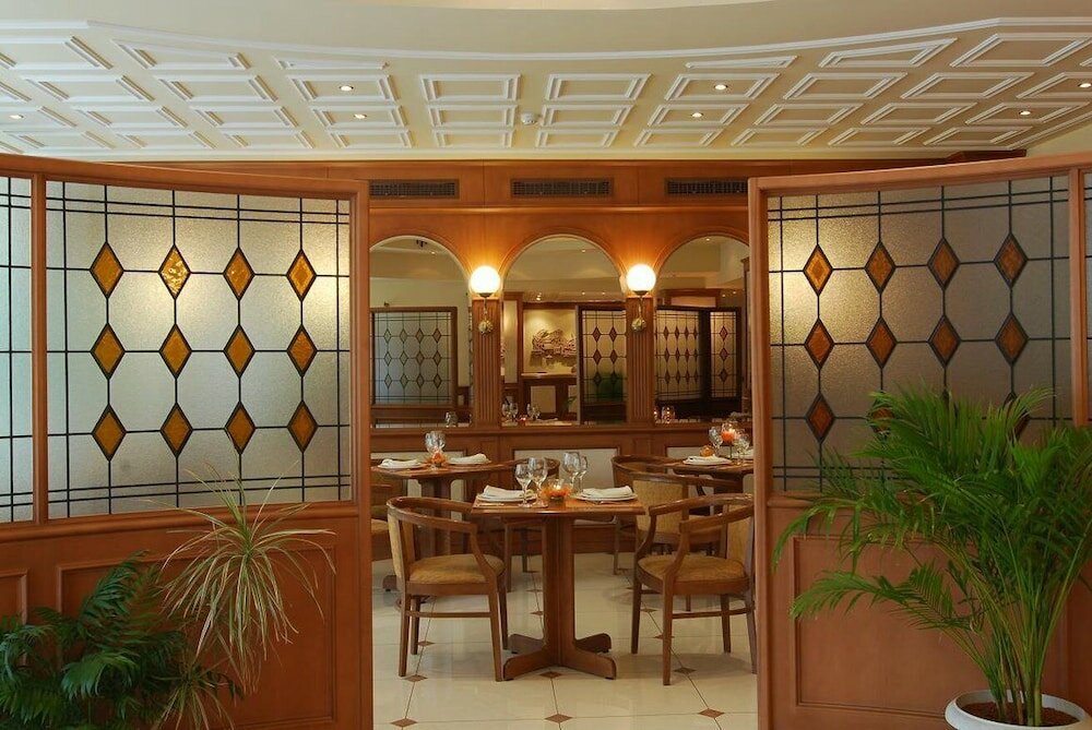 Фото Athens Atrium Hotel and Suites