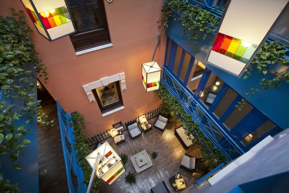 Фото Suites Gran VIA 44 Apartahotel