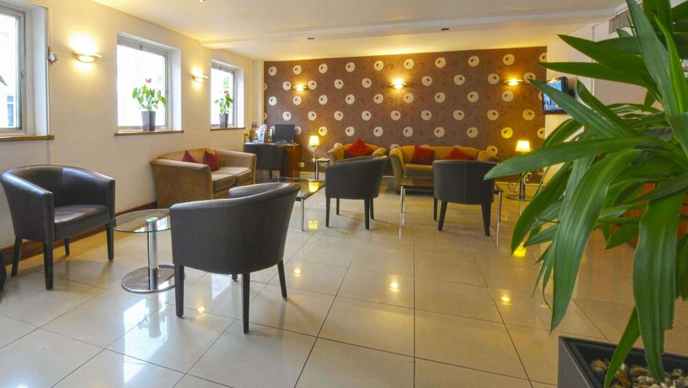 Фото Kensington Court Hotel