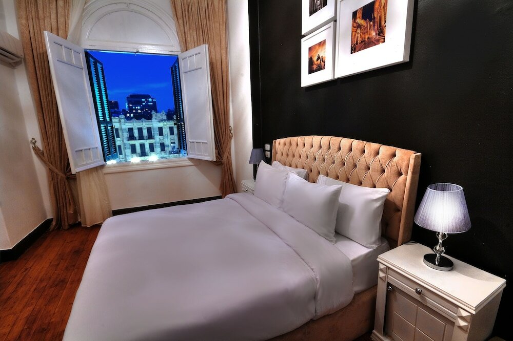 Фото The Square Boutique Hotel