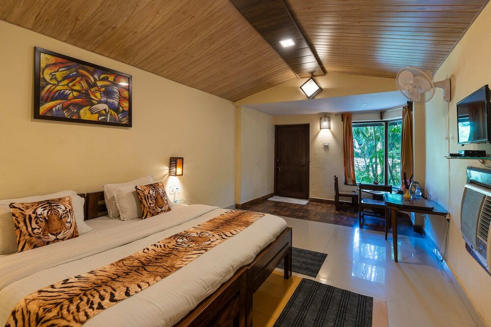 Фото Corbett Wild Resort - A River Access Property