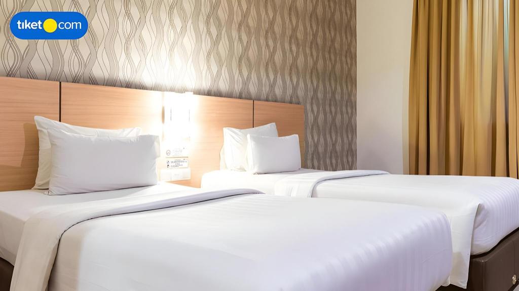 Фото Grand Impression Hotel Medan