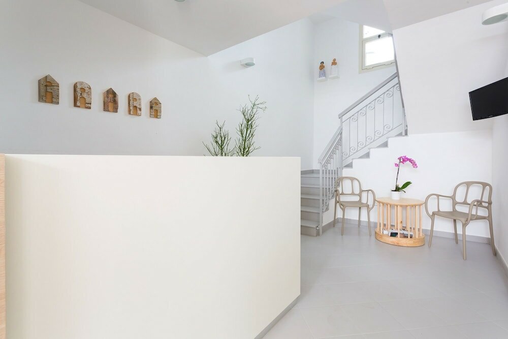 Фото Hotel L'Uomo e il Mare