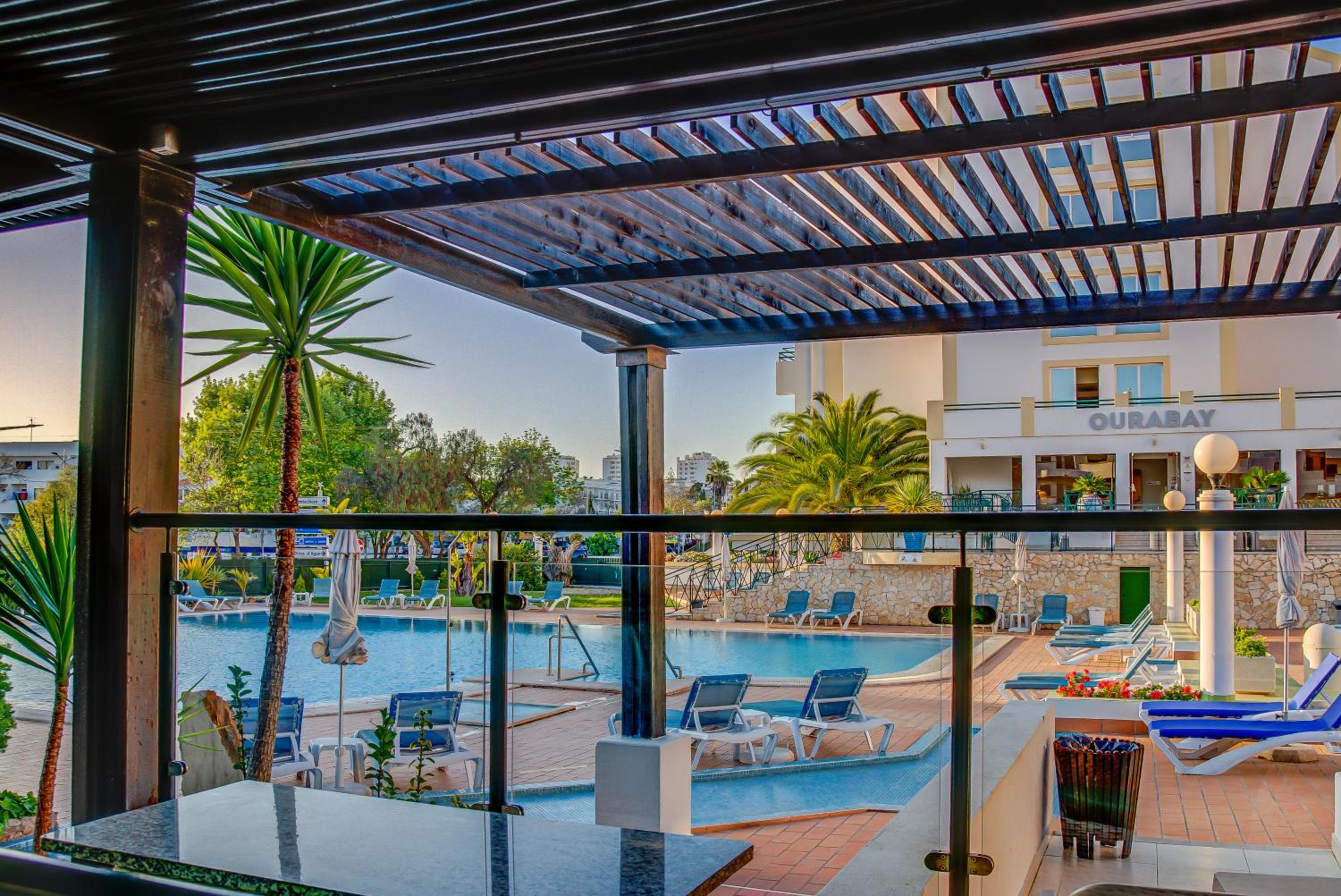 Фото Ourabay Hotel Apartamento