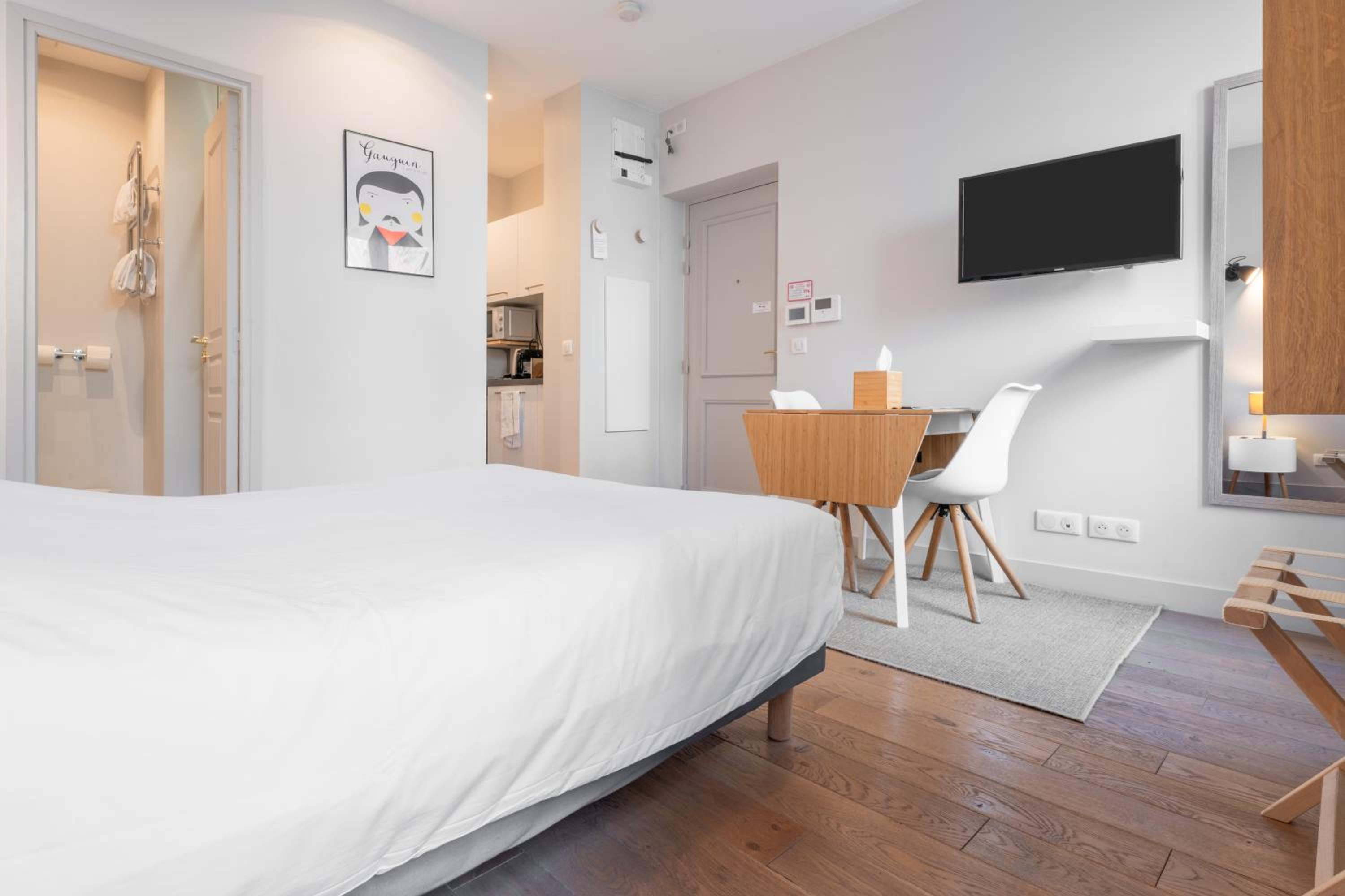 Фото Les Apparts de l'Oncle Louis