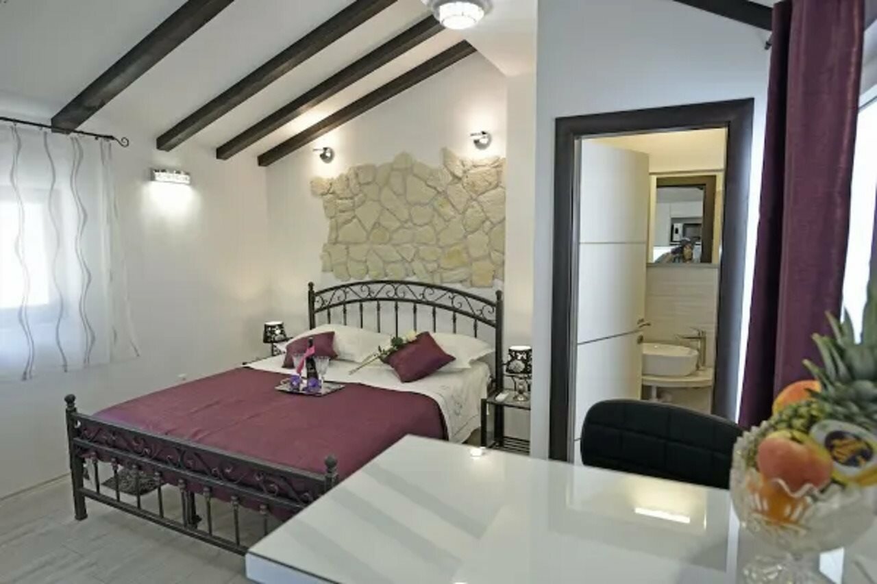 Фото Kuzma Rooms and Apartments
