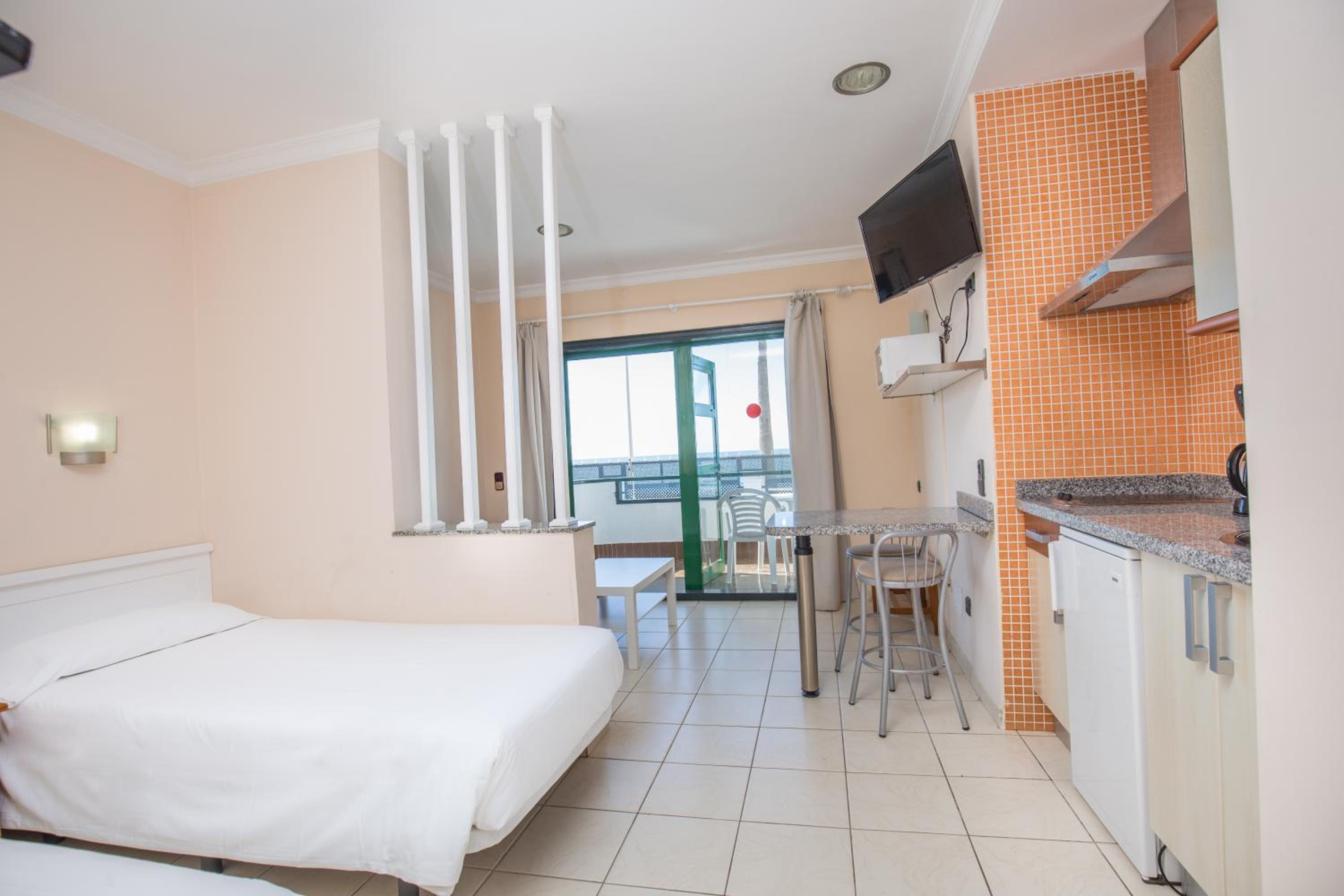 Фото Apartamentos Olympia