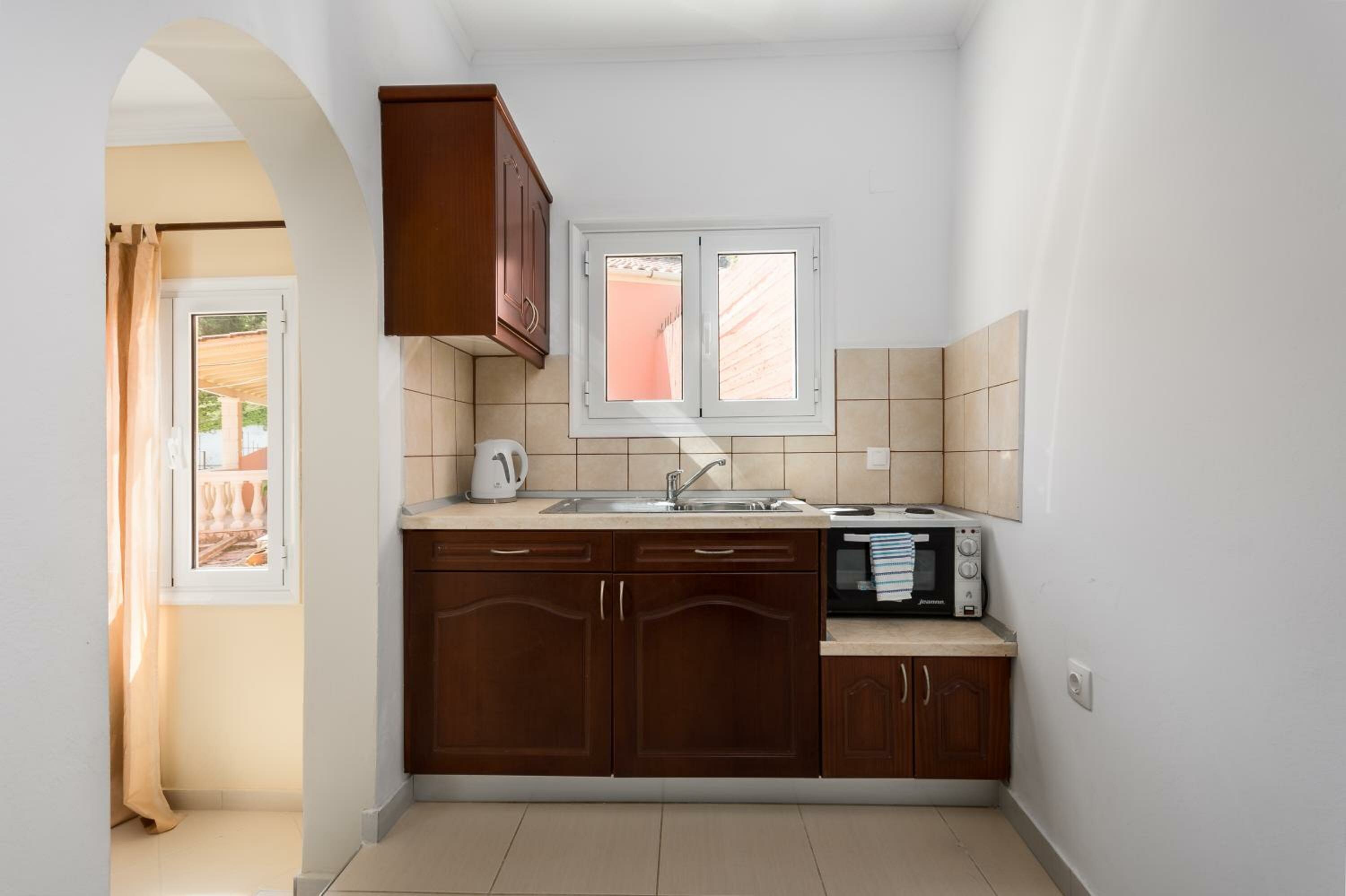 Фото Fouxia Apartments and Studios