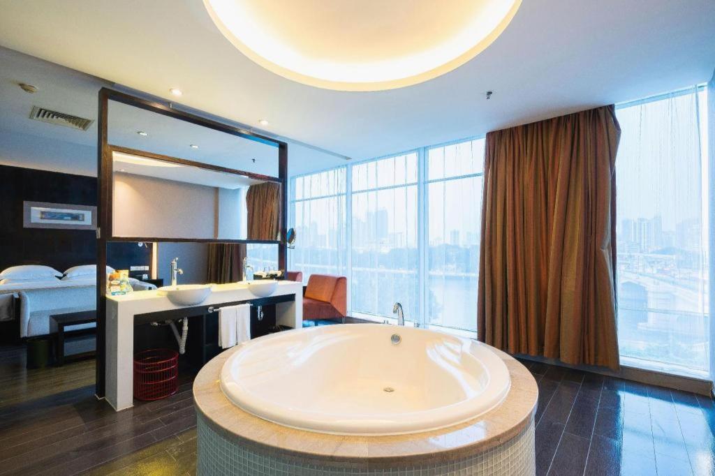 Фото Guangdong Nanmei Osotto Hotel