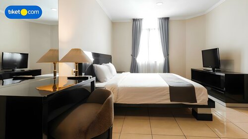 Гостиница Travellers Suites Serviced Apartments