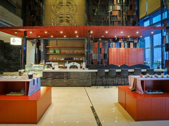 Фото Yiwu ShangCheng Hotel