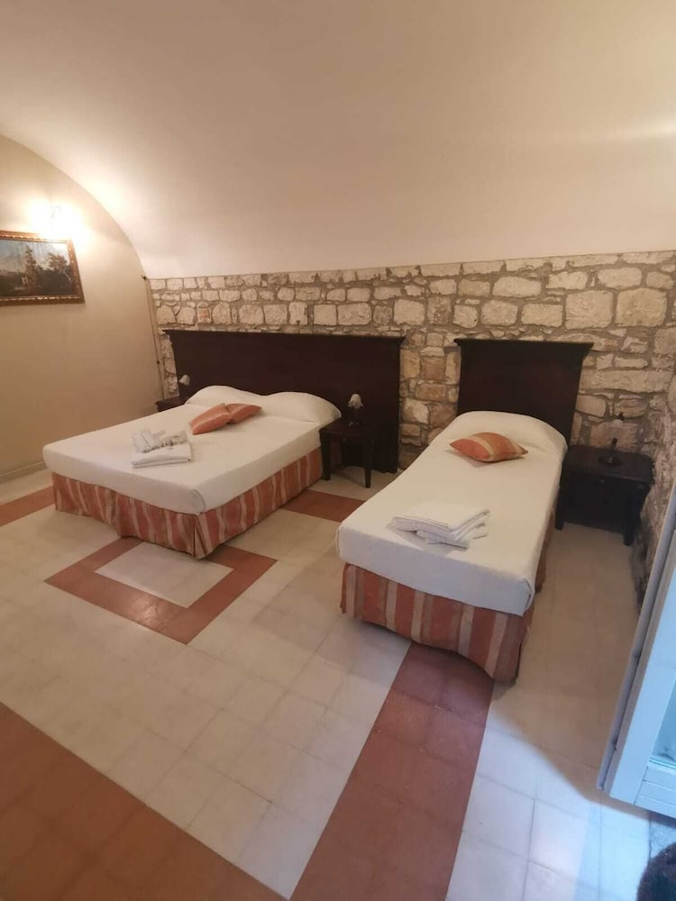 Фото Palazzo 'Il Cavaliere' - B&b di Charme