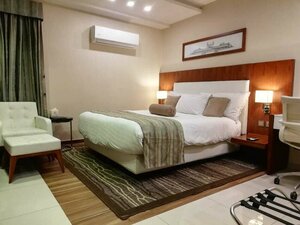 Гостиница Avari Xpress Hotel Faisalabad