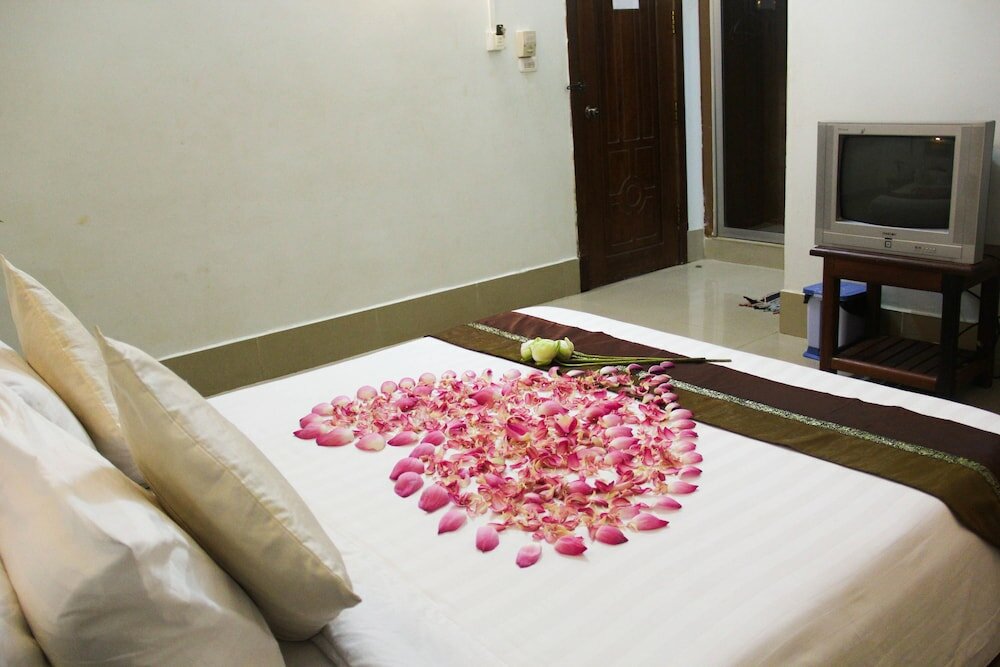 Фото Tropical Breeze Guesthouse