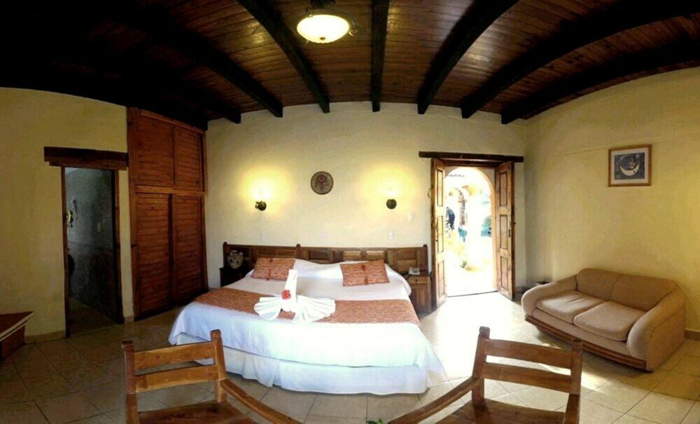 Фото Capital O Hotel Rincon Del Arco