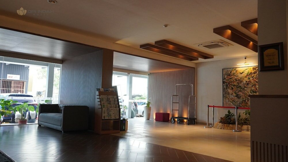 Фото Opi Indah Hotel