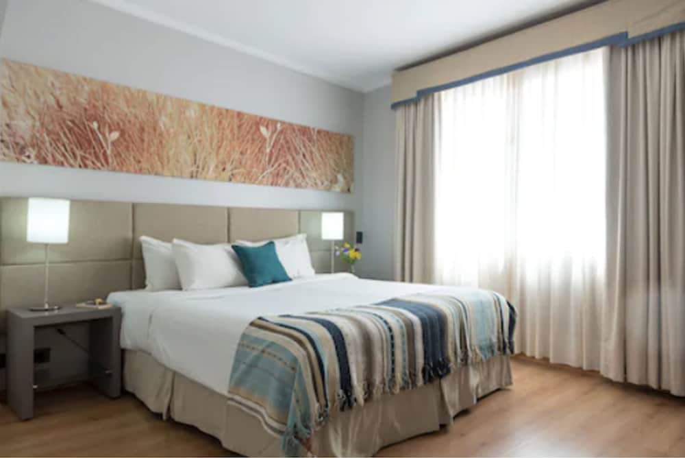 Фото Portal Plaza Suites