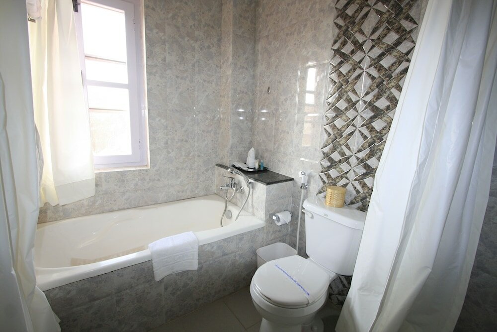 Фото Rama Inn Boutique Home