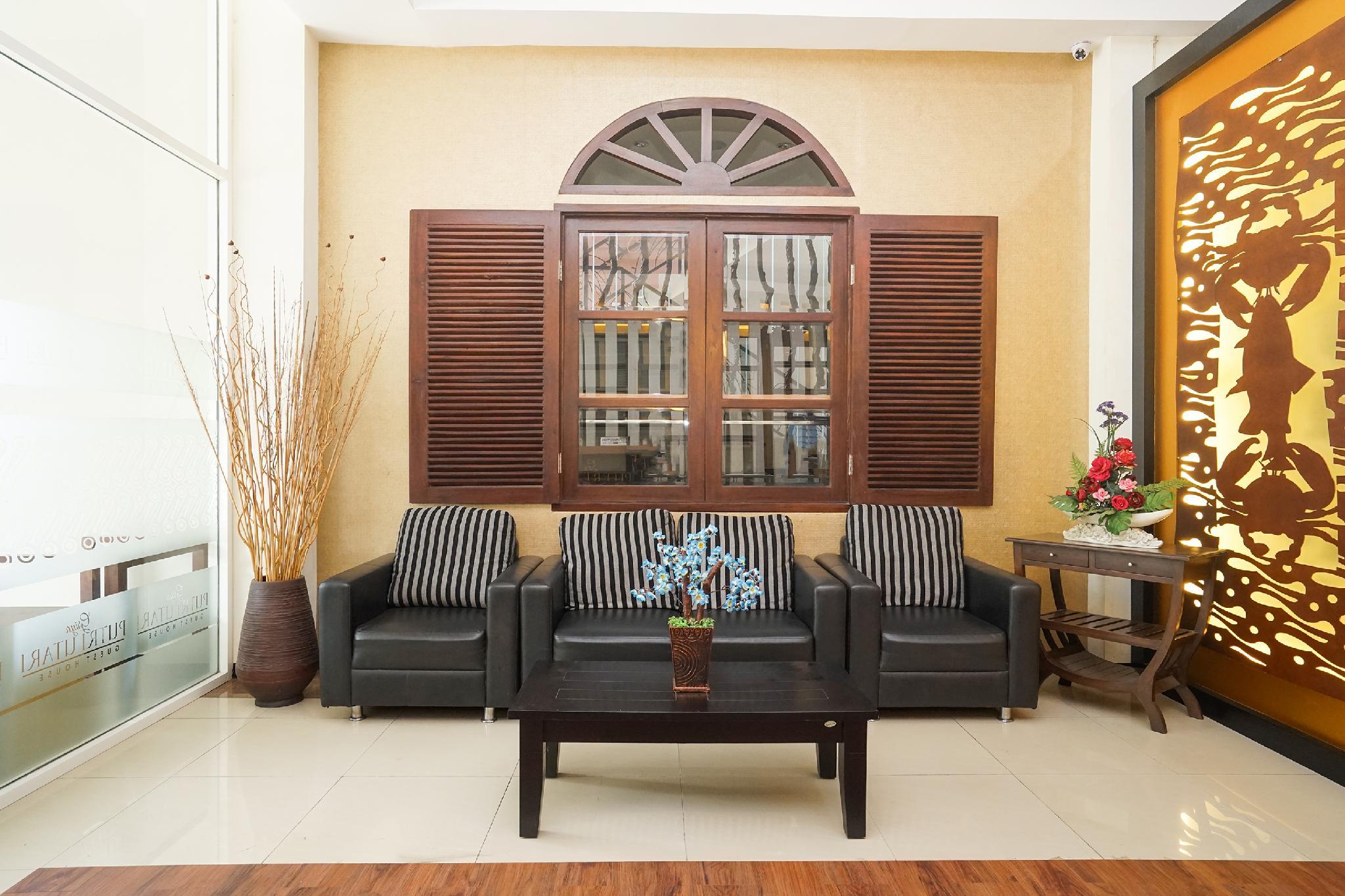 Фото Oyo 282 Putri Utari Guest House