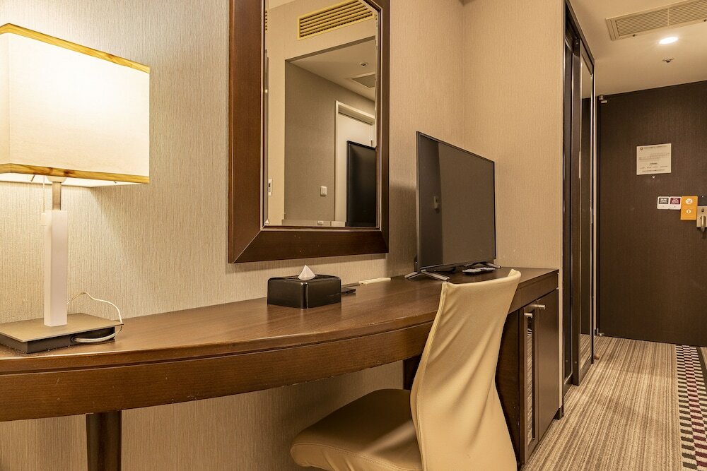 Фото Отель Санрут Плаза Синдзюку