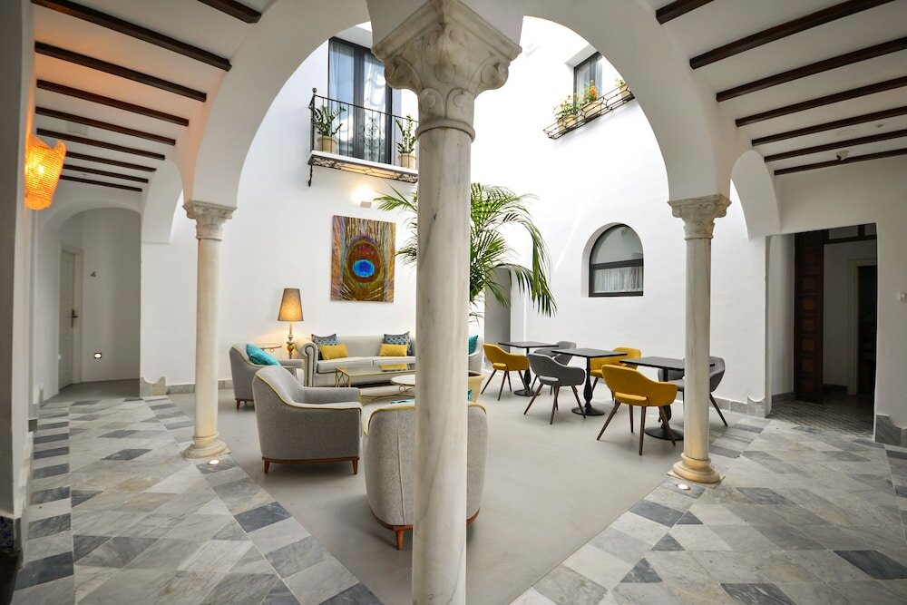 Фото Legado Alcázar Hotel