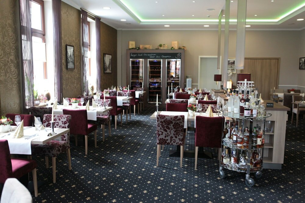 Фото Hotel Am Schloss Aurich Schlossresidenz