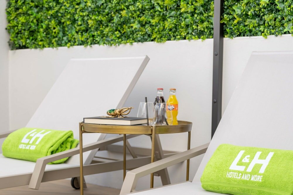 Фото L&h Gran VIA Valencia