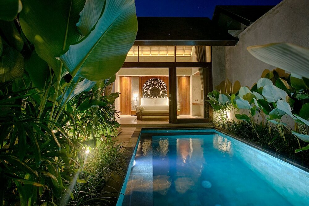 Фото Taman Dharmawangsa Suites