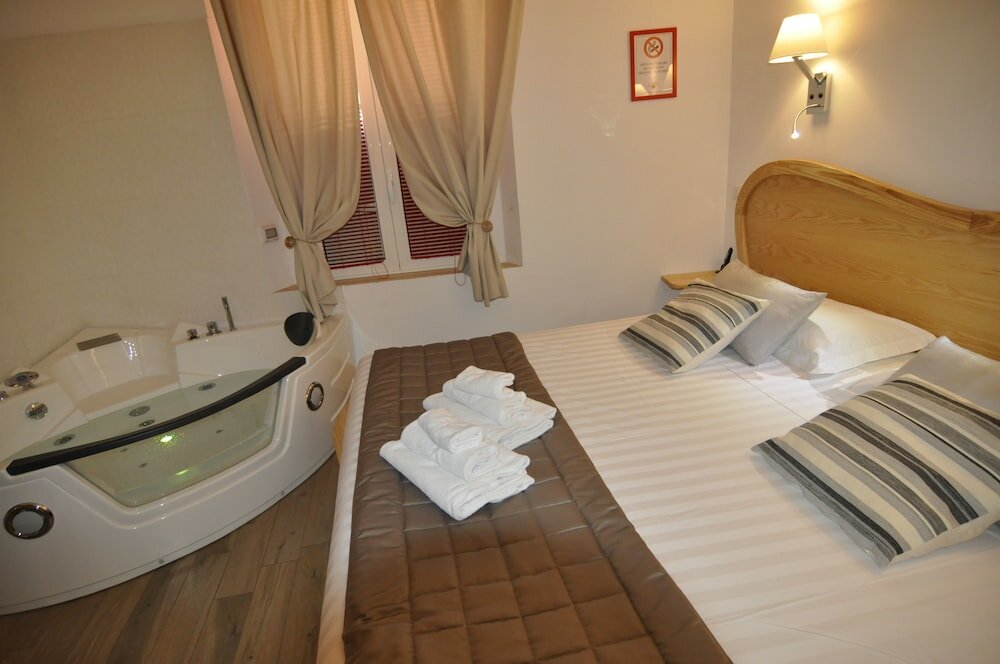 Фото Flatinrome Trastevere Deluxe Rooms