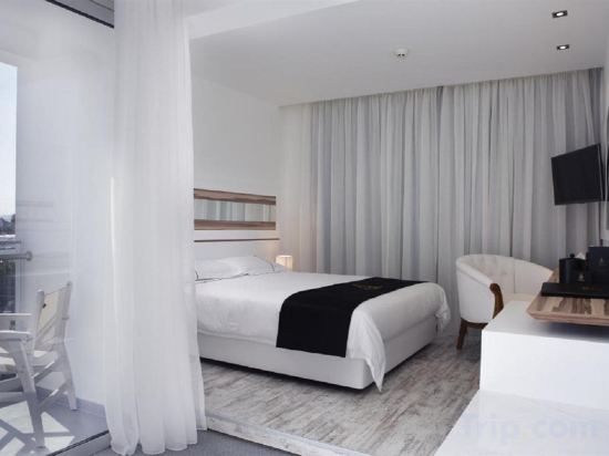 Фото The Ciao Stelio Deluxe Hotel