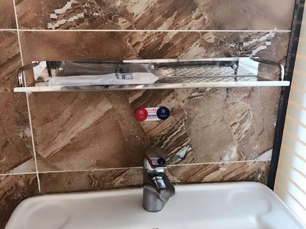 Фото 7 Days Inn Harbin Railway Station Zhanqian Square Branch