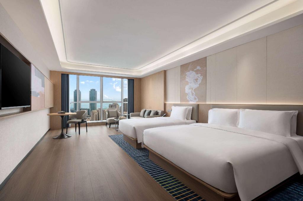 Фото Microtel by Wyndham Qingdao Huangdao