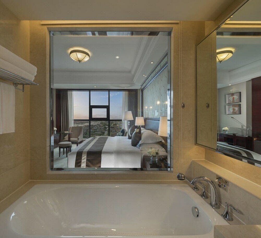 Фото Maison New Century Hotel Cixi