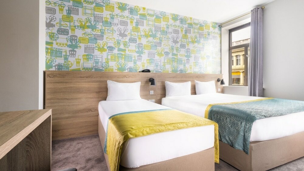 Фото Camden Deluxe Hotel