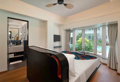Гостиница Lotus Beach Resort в Бенаулиме