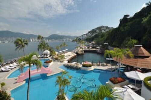 Гостиница Capital O Hotel Los Caracoles
