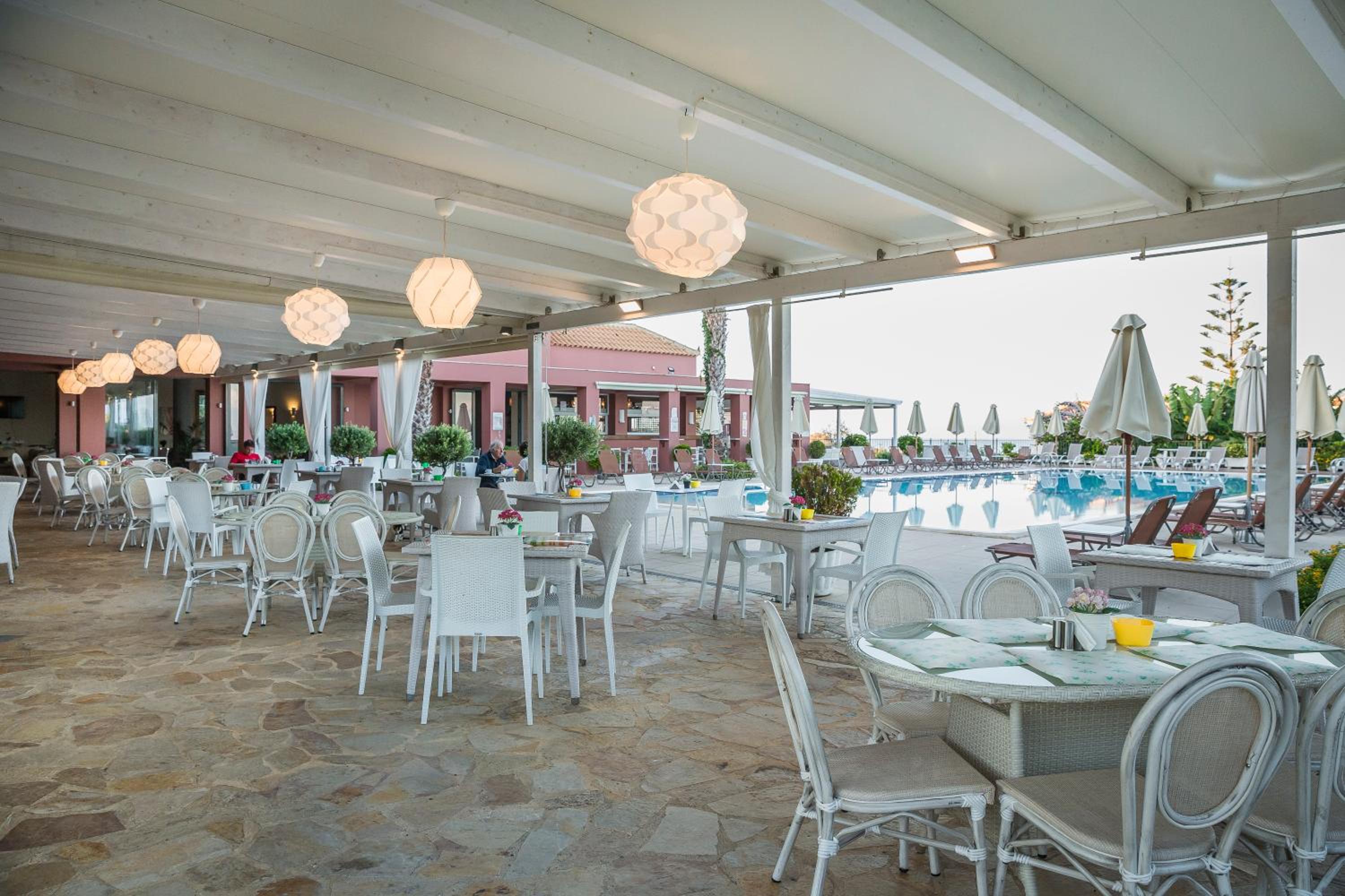 Фото Astra Village Hotel Suites